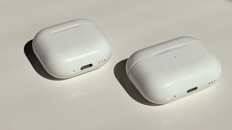 AirPods Pro 2 and AirPods 4 side by side on a desk