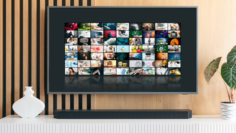 TV with a soundbar underneath it