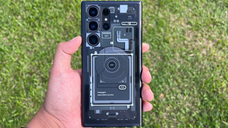 Close-up of a person holding the Samsung Galaxy S23 Ultra using the Spigen Zero One case