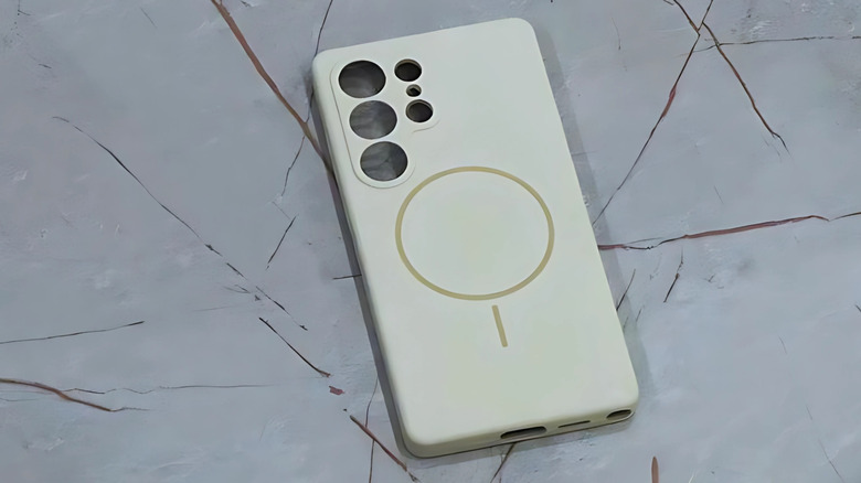 A Samsung Galaxy smartphone case with MagSafe support on a marble floor