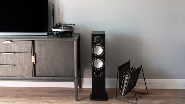 a speaker system beside a television