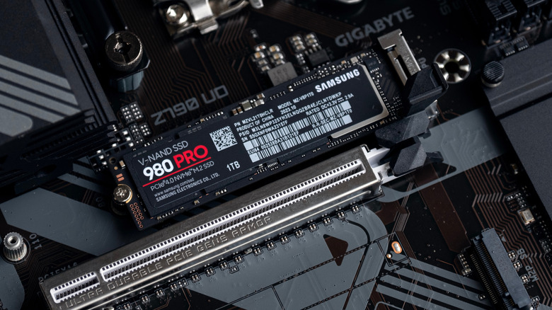 Close up of Samsung 980 Pro SSD connected to motherboard.