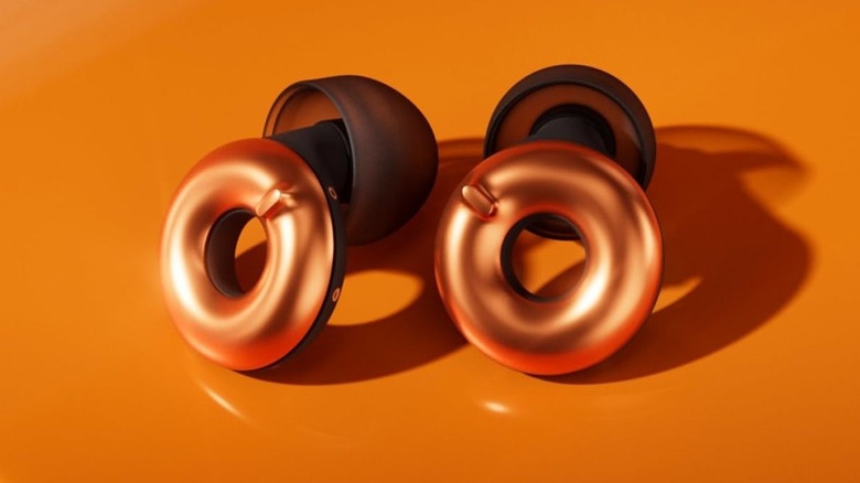 The orange and black McLaren Formula 1 edition of the Loop Earplugs.