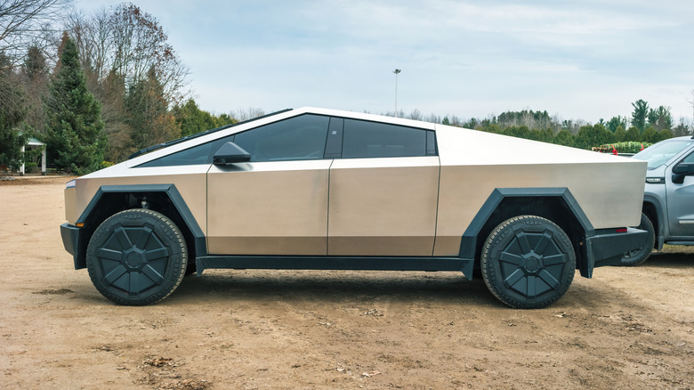 the Tesla Cybertruck parked in a ground