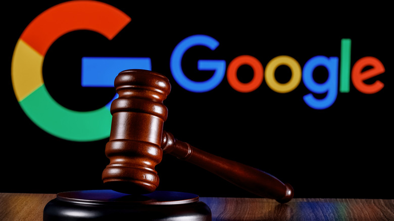 the Google logo behind a legal gavel