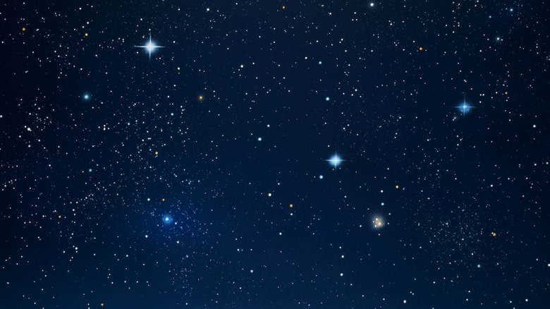 space, concept of planets, stars and moons on blue background