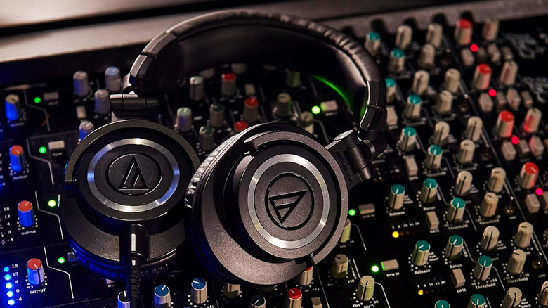 Audio-Technica ATH-AVC200 SonicPro Over-Ear closed headphones on sound board in studio