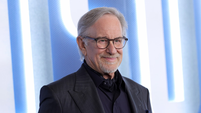 Director Steven Spielberg smiling at a press event