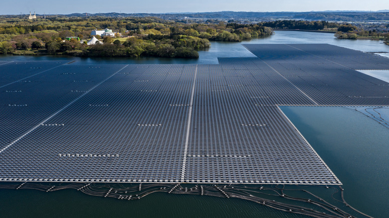 An aerial view shows the Yamakura Dam's floating solar panels in Chiba, Japan.