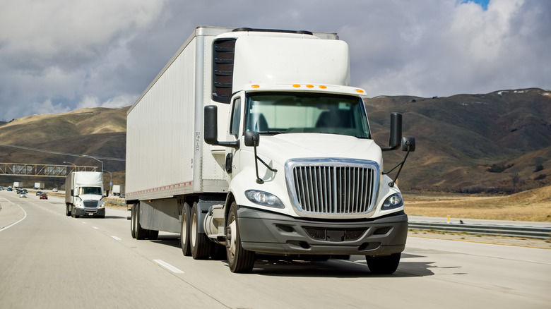 A semi-truck driving on a highway