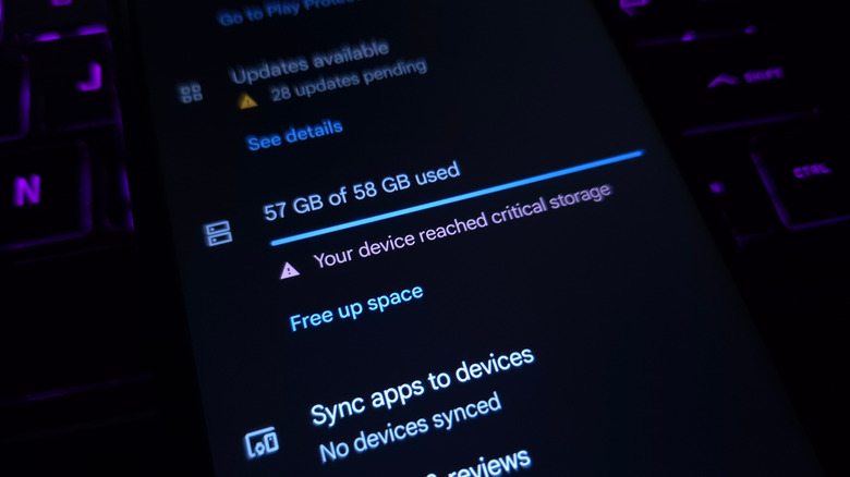 an android phone showing low storage on Google Play Store