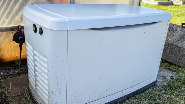 Emergency standby home generator outdoors.