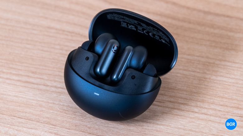 Baseus Inspire XP1 earbuds in their charging case