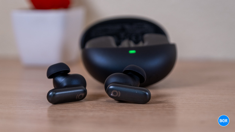 Baseus XP1 earbuds on a table