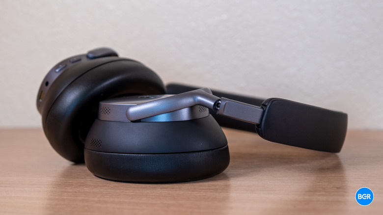 Baseus XH1 headphones on a table