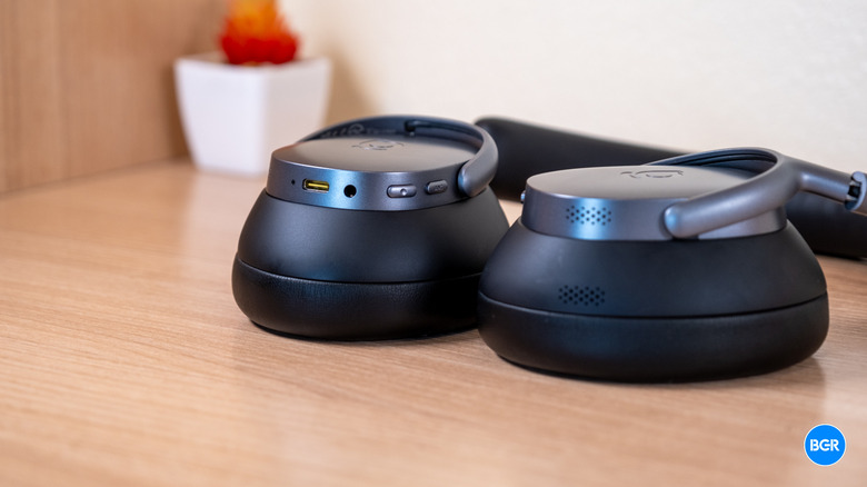 Baseus XH1 headphones flat on a table