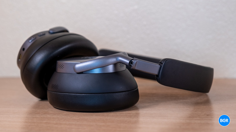 Baseus XH1 headphones on a table