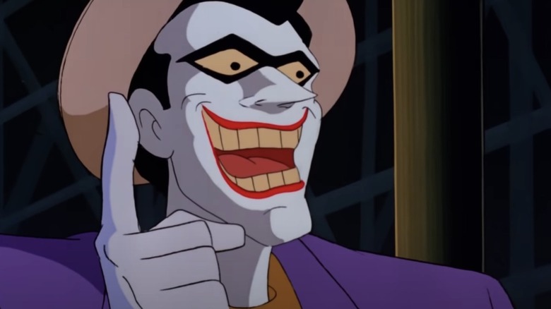 Joker having an idea smiling