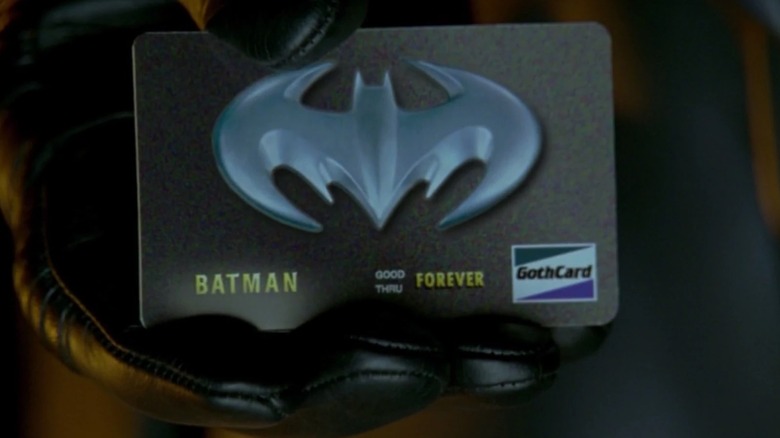 Batman holding the Bat-Credit Card