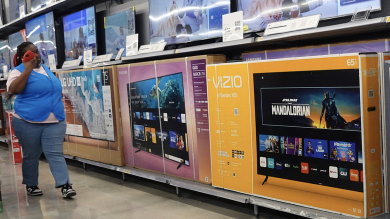 Vizio TVs on display in a Walmart store