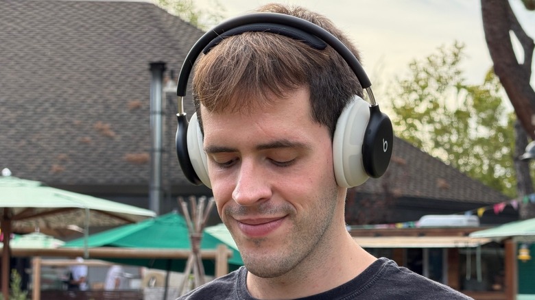 Man listening to music on Beats 360 headphones