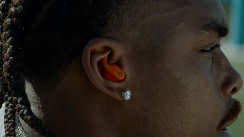 Athlete seen with Beats' upcoming Powerbeats Fit earbuds