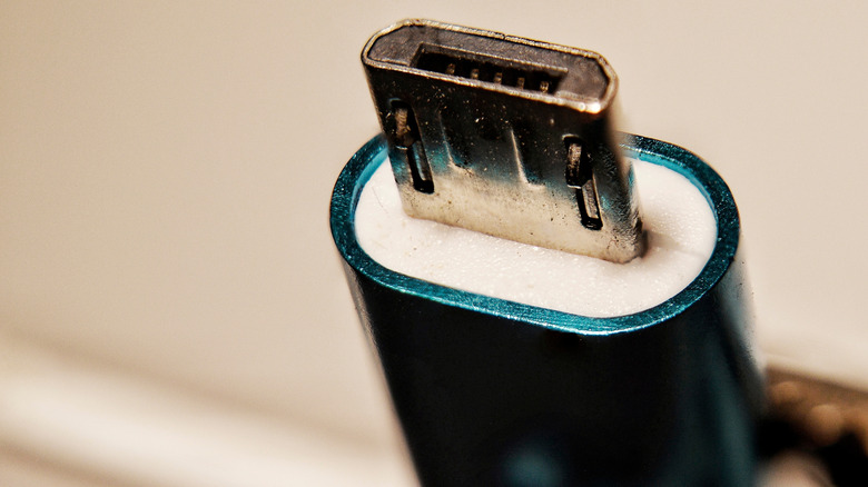 Micro USB charging head for topping up cell phones