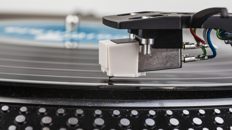 Close-up image of a stylus on a vinyl record.