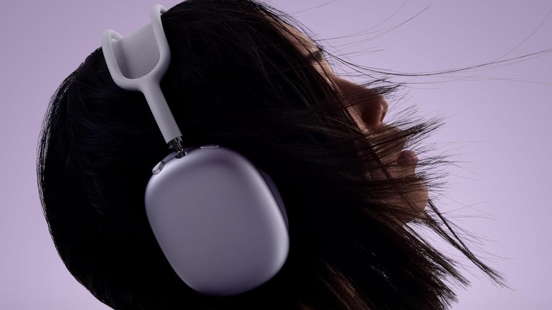 Apple AirPods Max 2 worn while jamming out to music.
