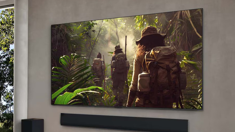 A man looking at the LG G5 OLED