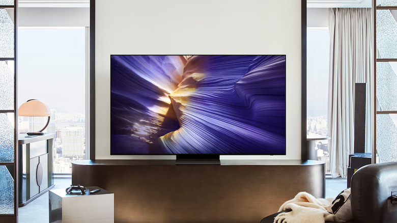 The Samsung S90F OLED placed in a living room