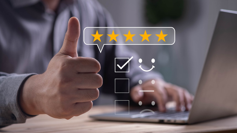 Holographic images of a five star user rating