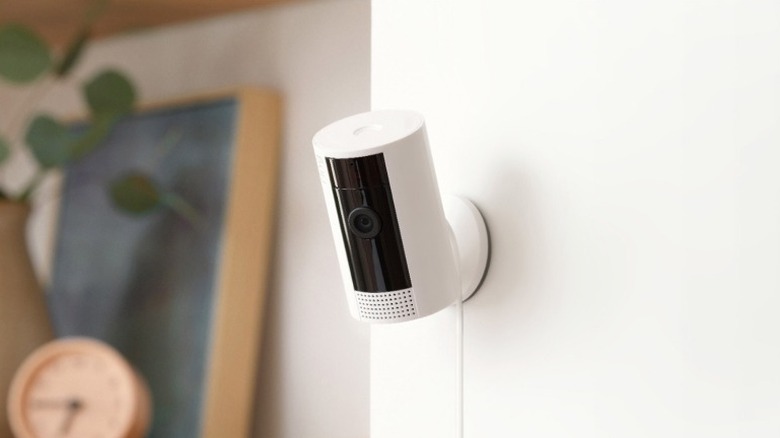 Indoor security camera mounted on a wall
