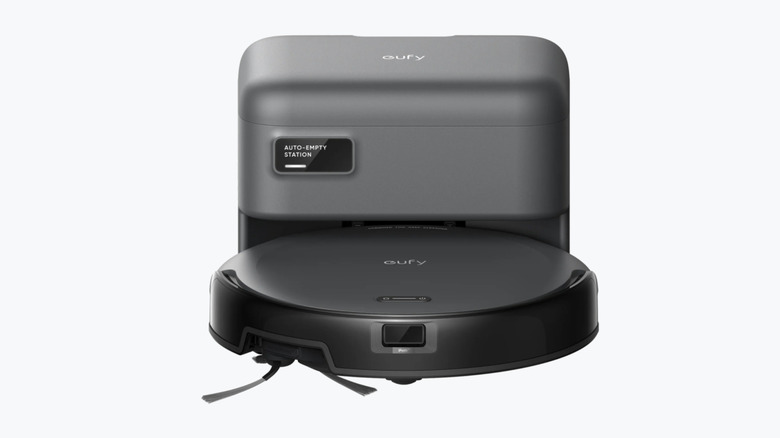 The Eufy C10 vacuum in its docking station.