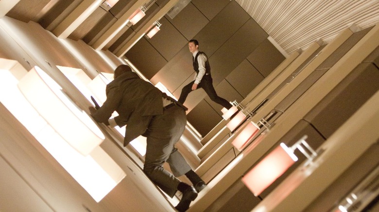 Arthur (Joseph Gordon-Levitt) traversing a rotating hallway in Inception