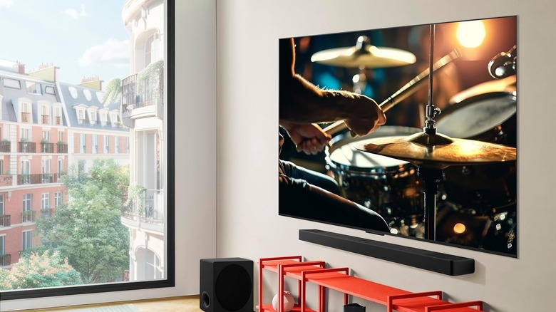The LG C5 mounted on a wall with a soundbar below