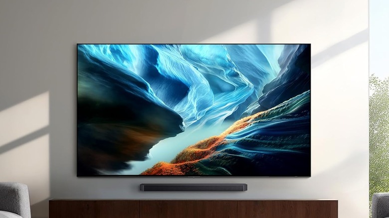 Samsung OLED S90H with a multicolored screen in a living room