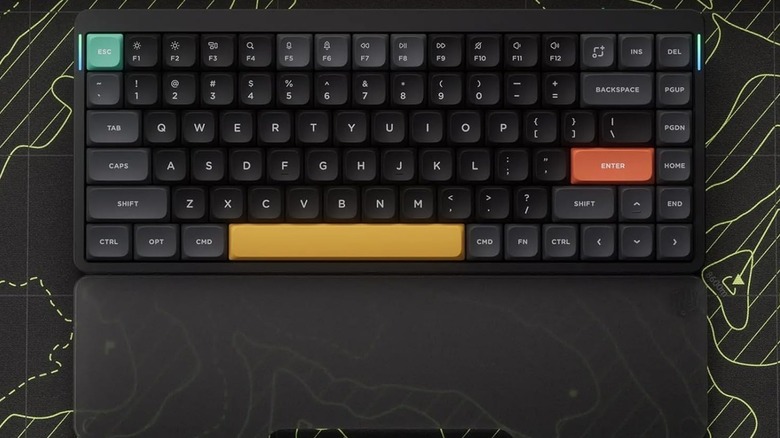 A photograph of the NuPhy Air75 mechanical keyboard on a desktop mat.
