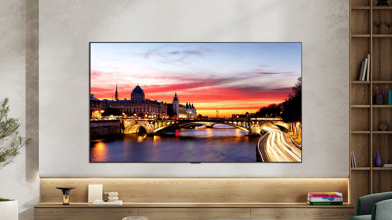 The LG C6 TV mounted on a wall in a living room