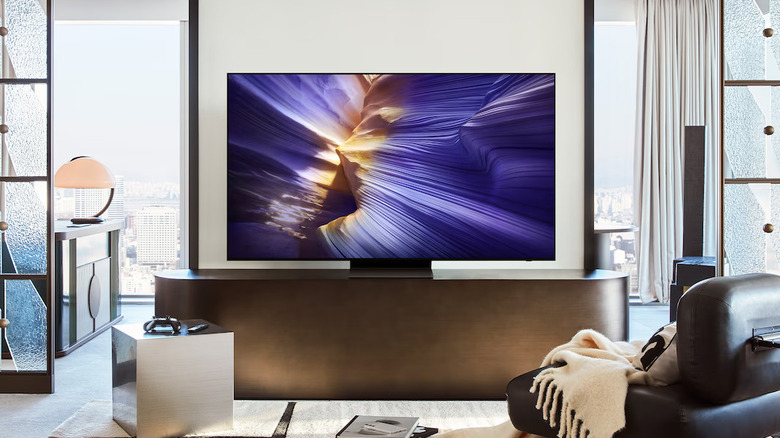 The Samsung OLED S90F placed in a living room