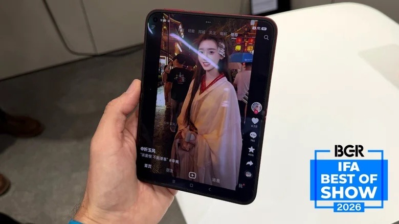 Close-up shot of foldable phone with TikTok open up