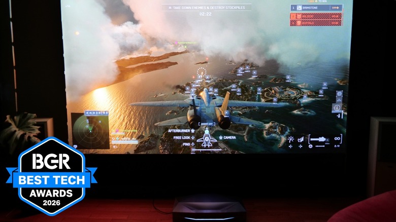 AWOL Vision Aetherion Max projector displaying a video game on the wall.