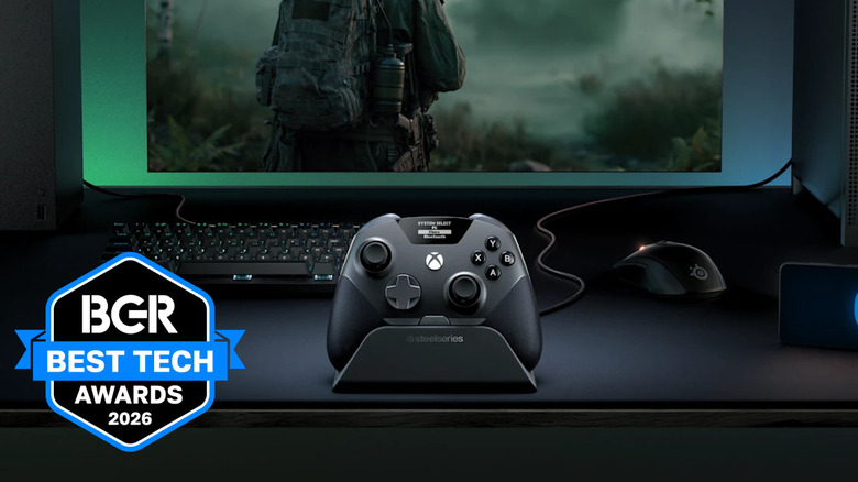 The SteelSeries Aeon Pro controller on a PC desk with mouse and keyboard