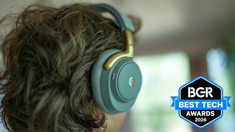 SteelSeries Arctis Nova Elite headphones sitting on a man's head.