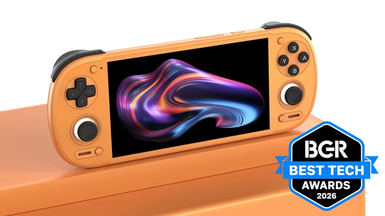 An orange Retroid Pocket 6 sitting on an orange table.