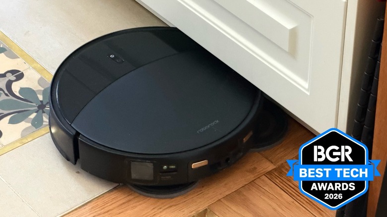 Roborock Saros 20 robot vacuum cleaning a hardwood floor.