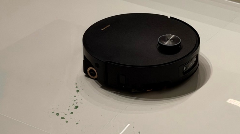 Robot vacuum cleaning a hard floor