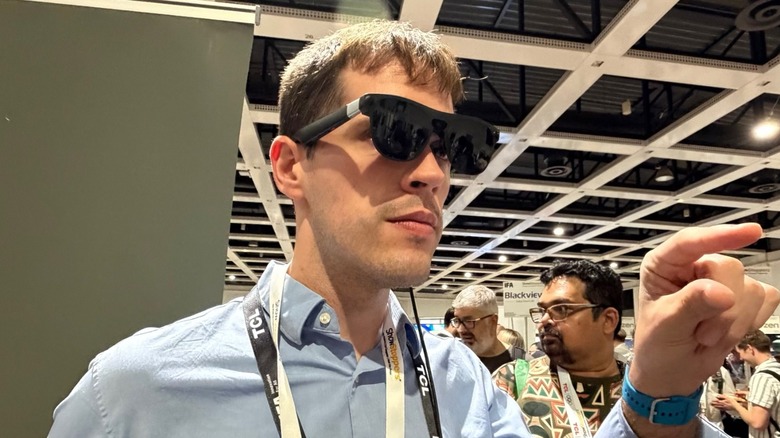Man wearing XREAL's Aura glasses