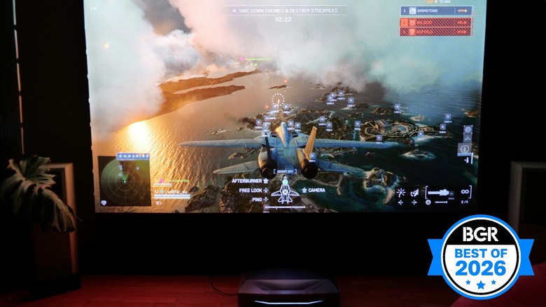 AWOL Vision Aetherion Max projector displaying a video game on the wall.