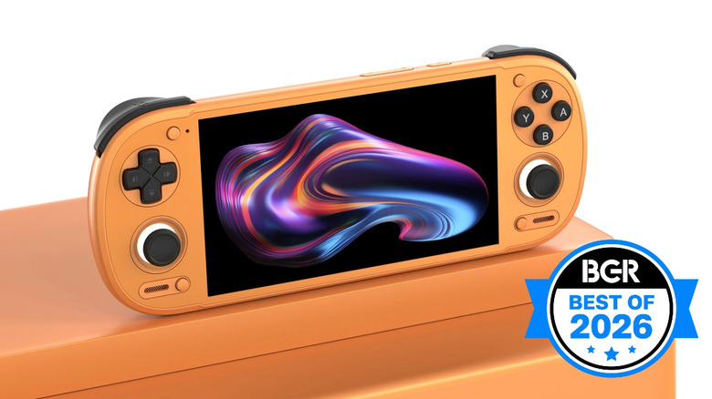 An orange Retroid Pocket 6 sitting on an orange table.